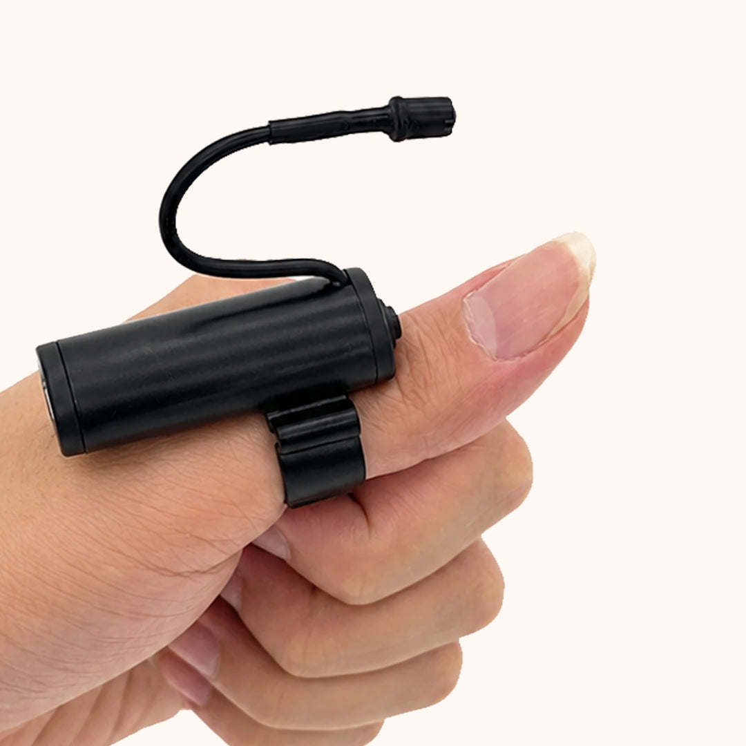 KOLYBEL LASH Professional USB rechargeable thumb lamp for lash artists. Hands-free thumb mount, adjustable brightness, for eyelash extensions & salon services.