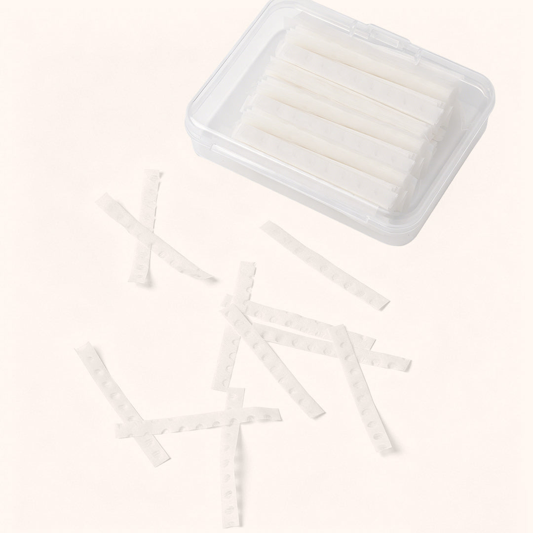 500-sheet lash lift paper covers for professional use. Lint-free, pre-cut strips ensure even reagent distribution and secure lash placement